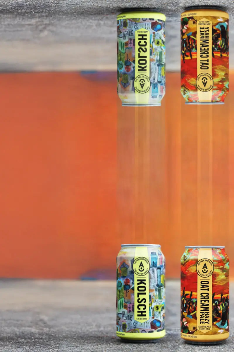 Four-pack of Aether Brewing’s Kolsch and Oat Cream Hazy Pale Ale with artistic labels. Brisbane-brewed, limited edition.