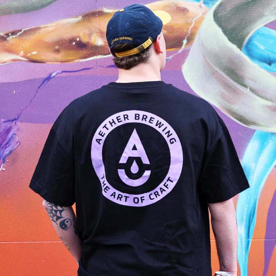 Brewery t-shirt by Aether Brewing – purple on black, back view