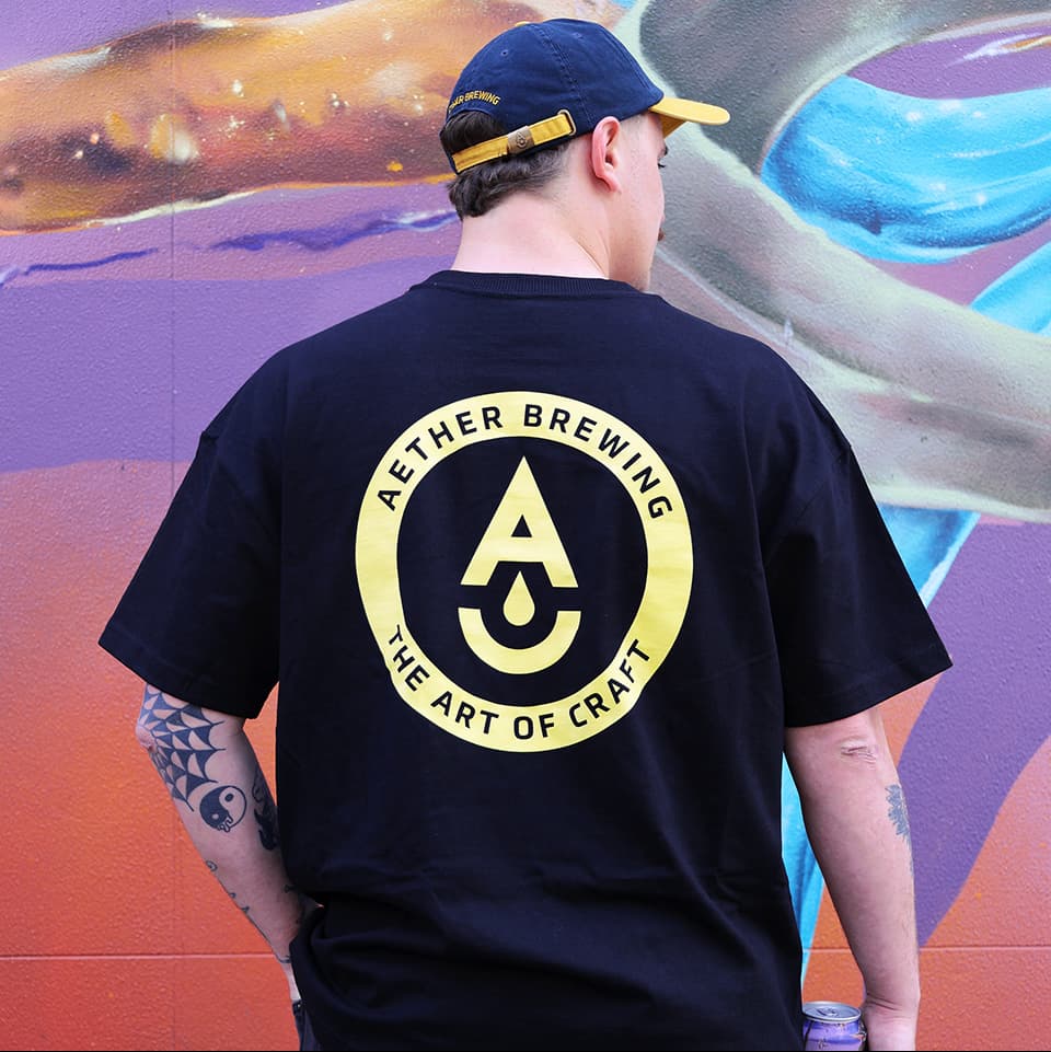 Brewery t-shirt by Aether Brewing – yellow on black, back view