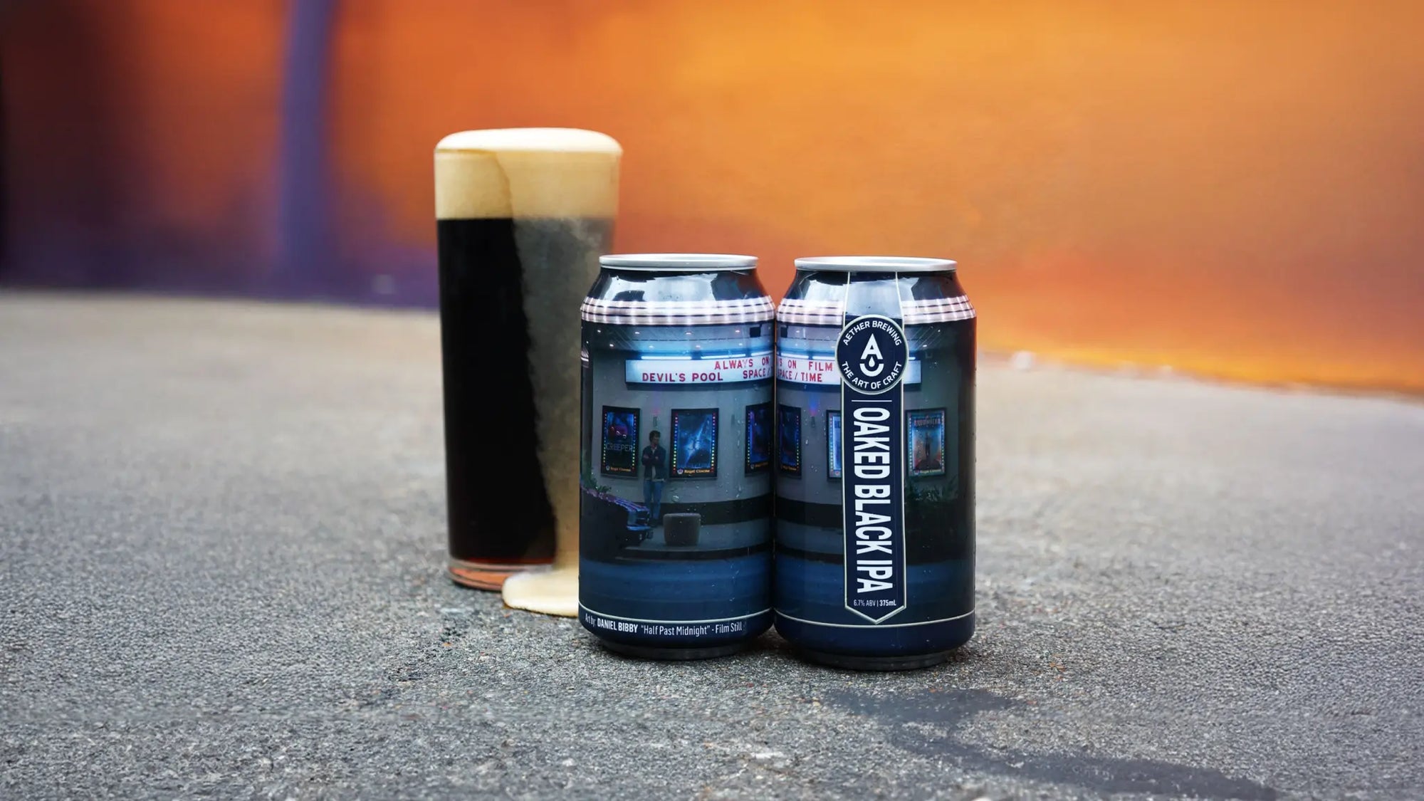 Cans and glass of Aether Brewing’s Oaked Black IPA. Small batch limited-edition preservative-free Brisbane craft beer.