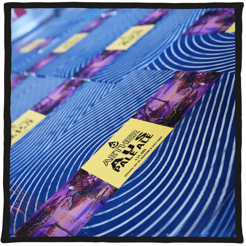 Pallet of Aether Australian Pale Ale cartons at the Craft Brewery in Northgate, Brisbane. Blue beer cartons with yellow and purple labels.