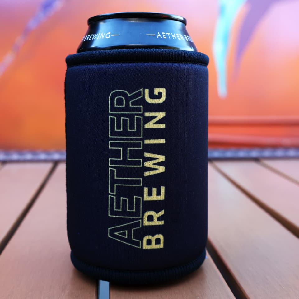 Aether Brewing stubby cooler – yellow on black design, back view