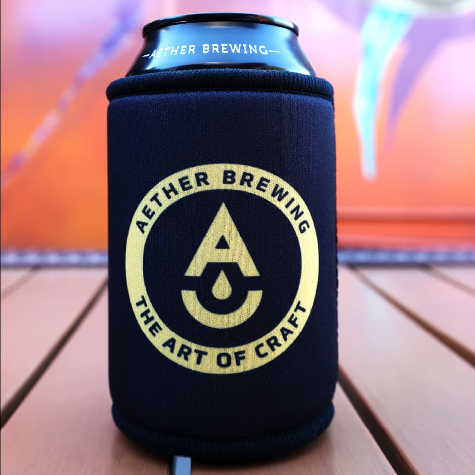 Aether Brewing stubby cooler – yellow on black design, front view
